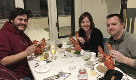 The Miraldi Lab enjoying lobsters.